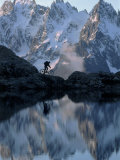 Person on a Mountain Bicycle in the Alps Lámina fotográfica por Vloo Phototeque Person on a Mountain Bicycle in the Alps Lámina fotográfica por Vloo Phototeque