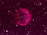 Boule de gaz rouge dans l'espace Photographie par Arnie Rosner