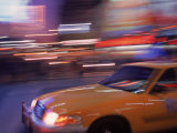 Blurred View of Taxi Cab in Times Square, NYC Fotografie-Druck von Rudi Von Briel