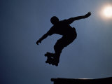 ATH046 Rollerblader in mid-air Photographie par Jeff Greenberg