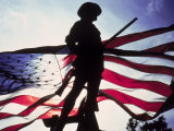 Silhouette of Soldier in Front of Flag Photographic Print by Whitney & Irma Sevin