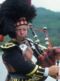 Bagpipe Player, Scotland Photographic Print by Peter Adams