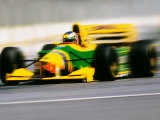 Yellow Race Car in Motion Photographic Print by Peter Walton