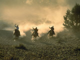 Three Wranglers Riding Horses with Lassoes, OR Photographic Print by B Gillingham