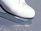Close-up of Figure Skate on Ice Photographic Print by Ken Wardius