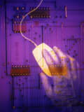 Hand on Computer Mouse with Computer Circuit Board Photographie par Gary Conner