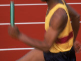 Sprinter Running with Baton Photographic Print by Peter Adams
