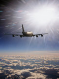 Airplane Flying Through Clouds Fotografie-Druck von Peter Walton