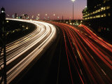 Motion Image of Cars on City Street Fotografie-Druck von Guy Crittenden