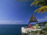 Rock House with Colorful Chairs, Negril, Jamaica Photographic Print by Timothy O'Keefe