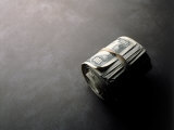Roll of Money Held Together with Rubber Band Photographie par Howard Sokol