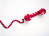 Red Telephone Handset Photographic Print by Erin Garvey