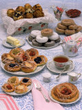Table Set with Tea and Various Pastries Photographic Print by Katie Deits