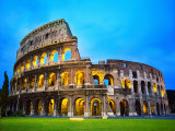 The Colosseum in Rome at Night Photographic Print