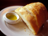 Crusty French Bread and Olive Oil Photographic Print by Fogstock Llc 