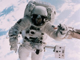 Astronaut Walking in Space Photographic Print by David Bases