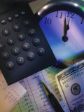 Calculator Over Clock, Spread Sheet and Money Photographic Print by Eric Kamp