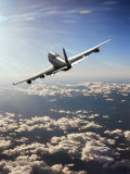 Airplane Flying Through Clouds Photographie par Peter Walton