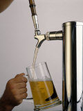 Tap Pouring Beer Into Mug Photographie par William Swartz