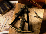 Charts, Books, and Various Tools Used in Map Making Photographic Print by Todd Gipstein