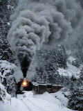 A Train Chugs Through the Snow Blanketing the San Juan Mountains Photographie par Paul Chesley