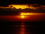Sunset at Anilao Photographic Print by Wolcott Henry