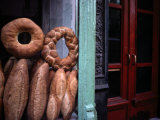 Bread is Displayed in a Store Window Photographic Print by Raymond Gehman