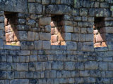 Sunlight Filters Through Stone Windows at Machu Picchu Photographic Print by Pablo Corral Vega