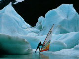 Windsurfer Practices His Sport Alongside Icebergs Photographic Print by Chris Johns