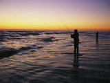 People are Surf Fishing for Red Drum on the Outer Banks of North Carolina Photographie par Stephen Alvarez