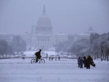 Snow Blankets the Mall and the Capitol Building Amid Winter Activity Photographic Print by Stephen St. John