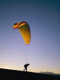 A Person Paraglides at Shiva Crater Photographie par Kate Thompson