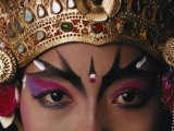A Close View of a Face of a Balinese Dancer in Costume and Makeup Photographie par Paul Chesley