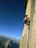 A Man Climbs Half Dome, Yosemite, California Photographic Print by Jimmy Chin