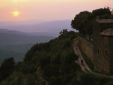 Man Walking at Sunrise on a Village Road in the Tuscan Countryside Photographic Print by O. Louis Mazzatenta