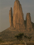 Five Spires, Dubbed the Hand of Fatima, Jut out of the Flat Desert Photographie par Bobby Model