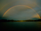 A Double Rainbow Rises over the Coast of Irian Jaya Photographic Print