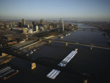 Aerial View of Barges Traveling the Mississippi River Past St. Louis Photographie par Ira Block