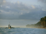 Fisherman Leave the Coast of Zanzibar in a Canoe for a Day on the Sea Photographic Print by Michael S. Lewis