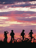 Silhouetted Bikers against a Twilight Sky Photographic Print by David Edwards