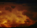 Lightning Bolts Crack Across a Menacing Sky Above Lake Tanganyika Photographic Print by Michael Nichols