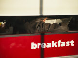 An Early Morning Diner Reads the Paper in Downtown Santa Fe Photographic Print by Stephen St. John