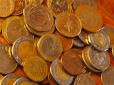 Coins, Including a One Euro Piece, Are Spread Out Photographic Print by Stephen Alvarez