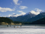Hockey on Frozen Green Lake in Whistler, British Columbia, Canada Photographic Print by Taylor S. Kennedy