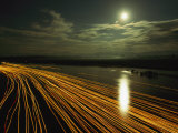 Time Lapse of Lights from Boats Moving on Water Photographic Print by Steve Winter