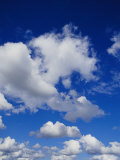 White, Fluffy Clouds Near Carnarvon National Park in Queensland Photographic Print by Jason Edwards