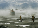 Members of the Volcanology Team Await the Helicopter in Gorely Volcano Crater Photographic Print by Peter Carsten