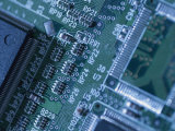 Close View of Computer Circuit Board Photographic Print by Taylor S. Kennedy
