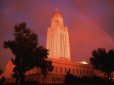 A Rainbow Shines Over the Nebraska State Capitol after a Storm Photographic Print by Joel Sartore