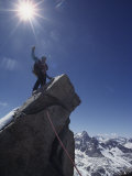 A Mountaineer Atop Mt Photographic Print by Gordon Wiltsie
